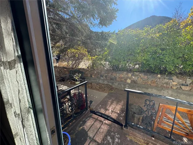 a view of a balcony with a swing