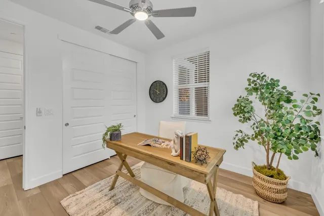 a bedroom with a bed and a couch