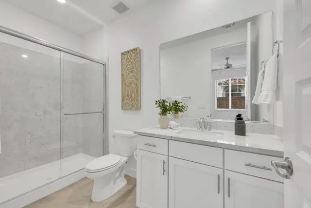 a bathroom with a sink and cabinets
