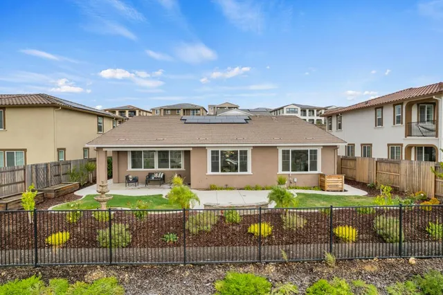 a spacious bathroom with a granite countertop sink mirror and a