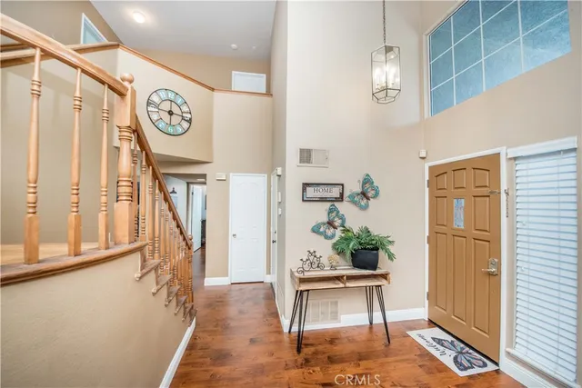 a view of entryway with a table and chairs