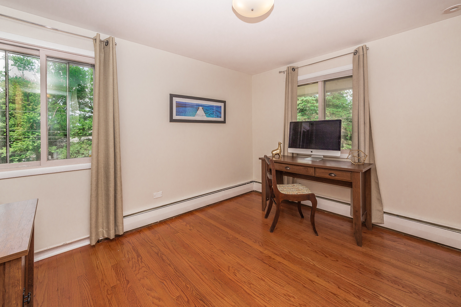 1440 Banbury Road Mundelein, IL 60060 - Photo 17 of 28 a view of a workspace with furniture and a window