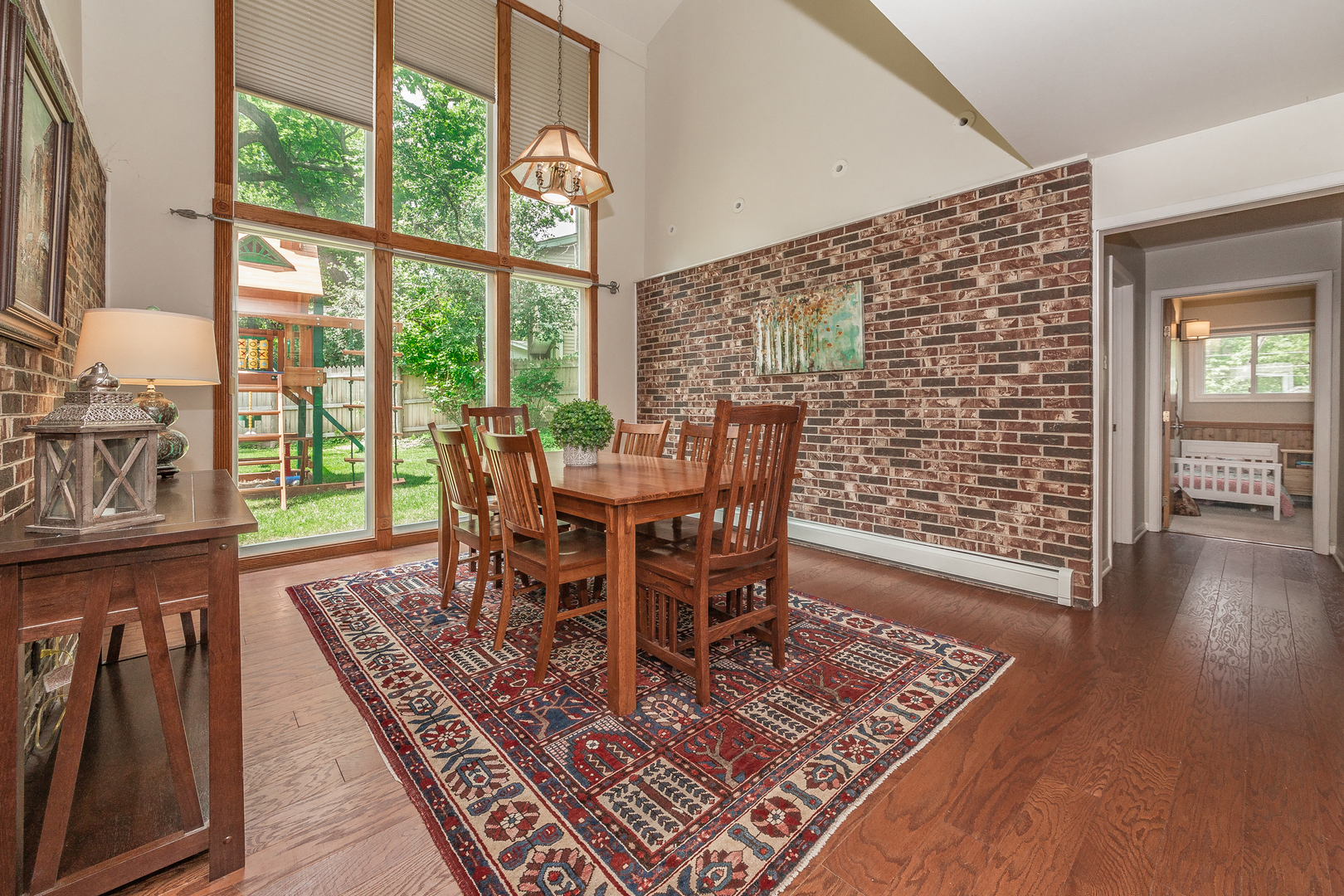 1440 Banbury Road Mundelein, IL 60060 - Photo 3 of 28 a view of a dining room with furniture window and wooden floor