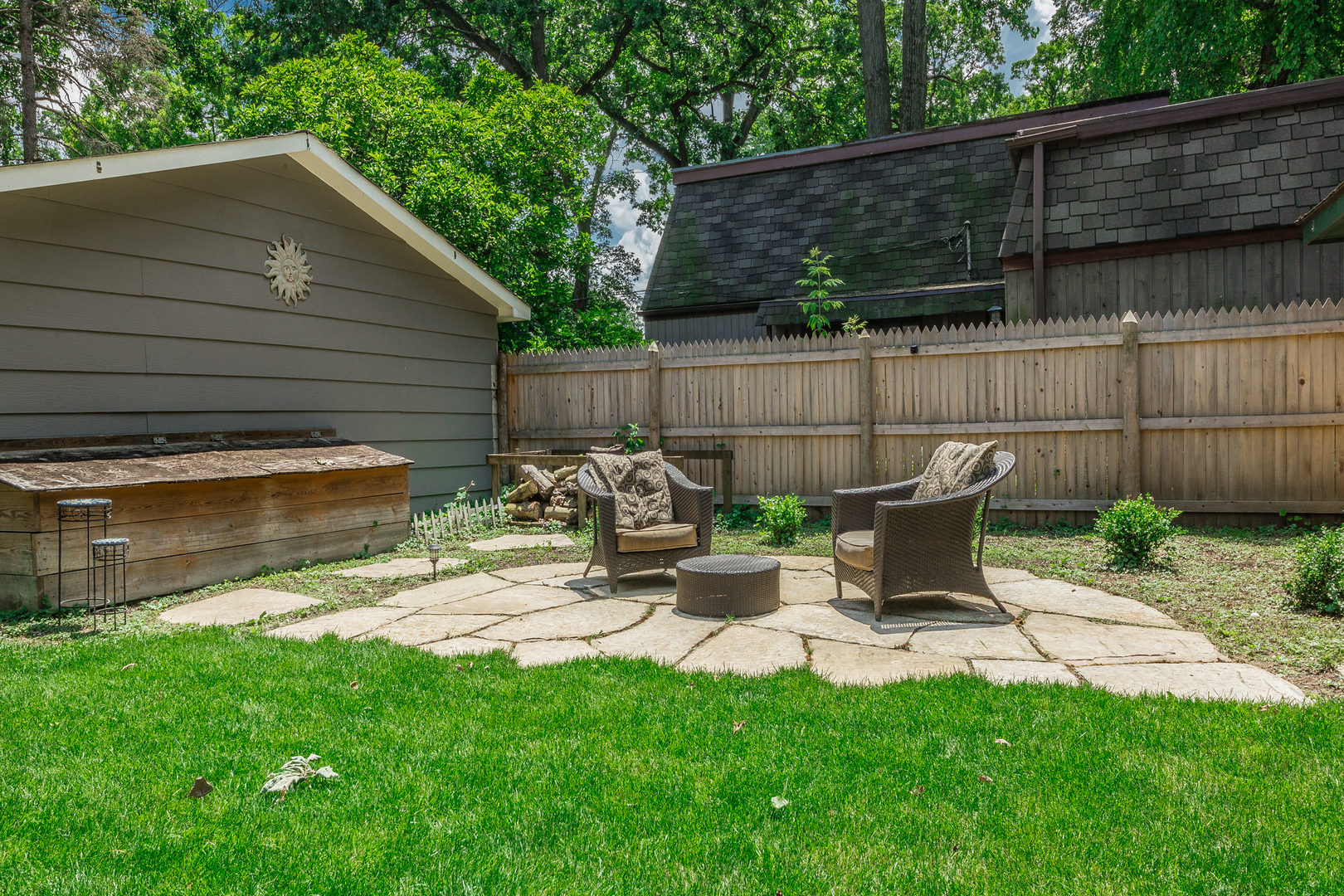 1440 Banbury Road Mundelein, IL 60060 - Photo 24 of 28 a view of backyard with a chair and table