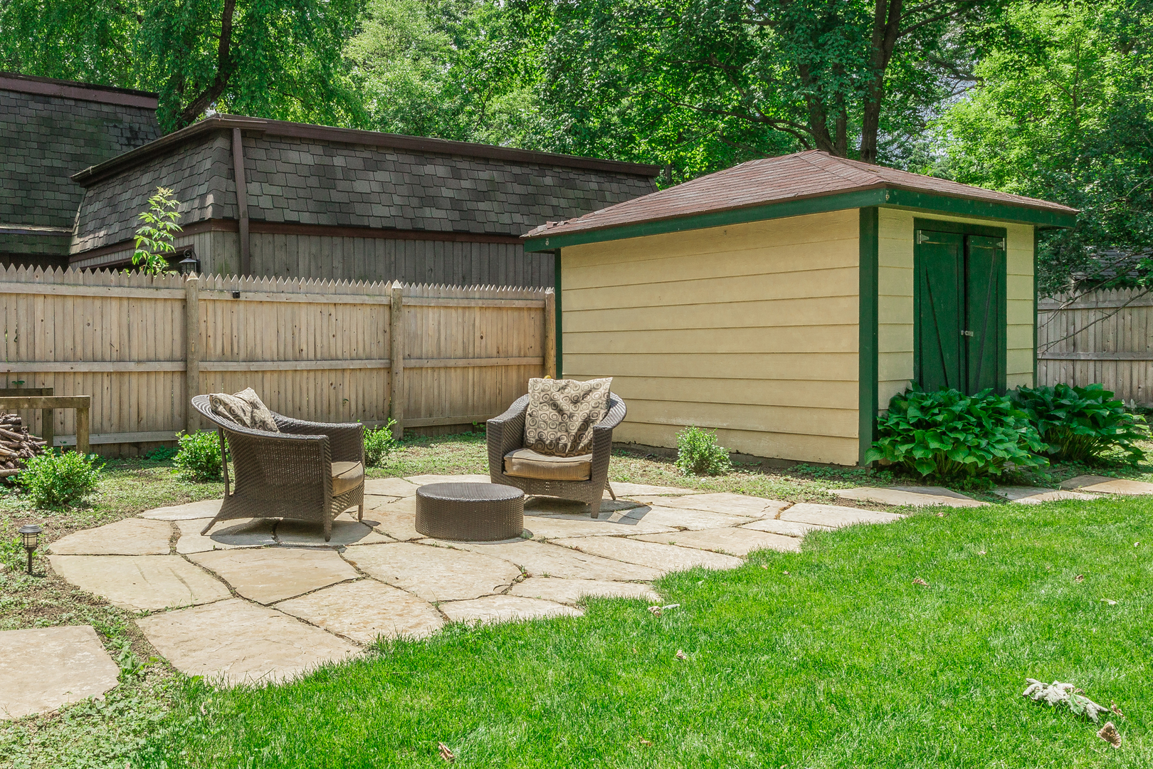 1440 Banbury Road Mundelein, IL 60060 - Photo 26 of 28 a view of a chair and table in backyard
