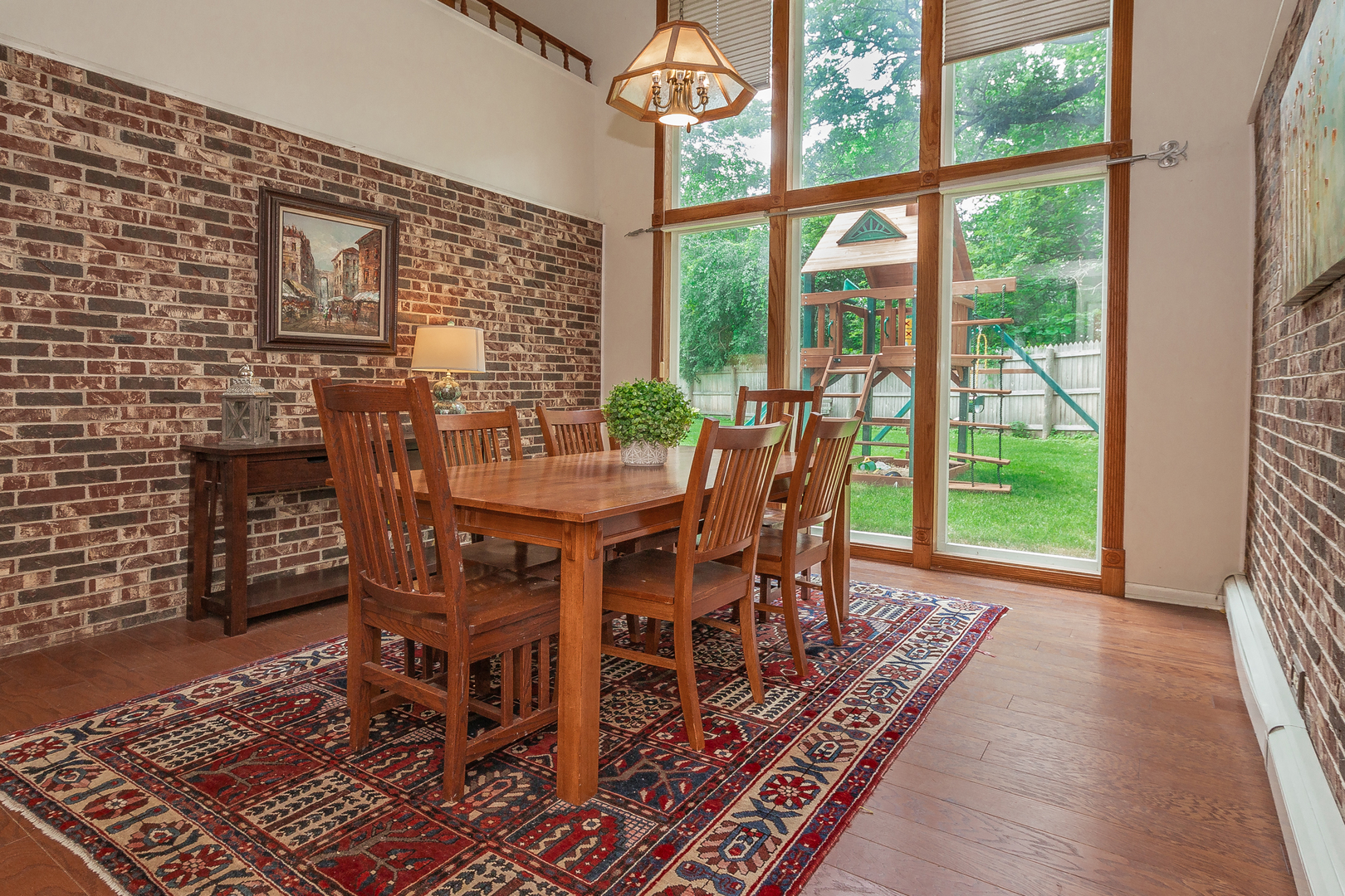 1440 Banbury Road Mundelein, IL 60060 - Photo 4 of 28 a view of a dining room with furniture window and wooden floor