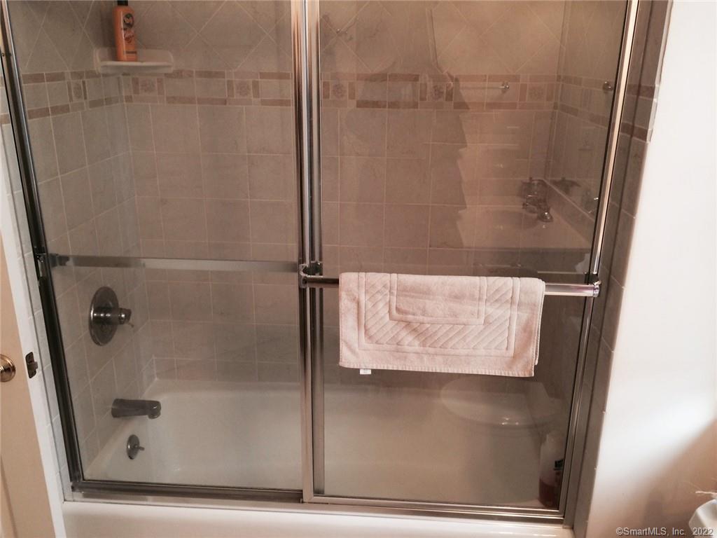57 Harbor Avenue Madison, CT 06443 - Photo 11 of 16 a bathroom with a shower