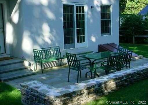57 Harbor Avenue Madison, CT 06443 - Photo 15 of 16 a view of a house with backyard and sitting area