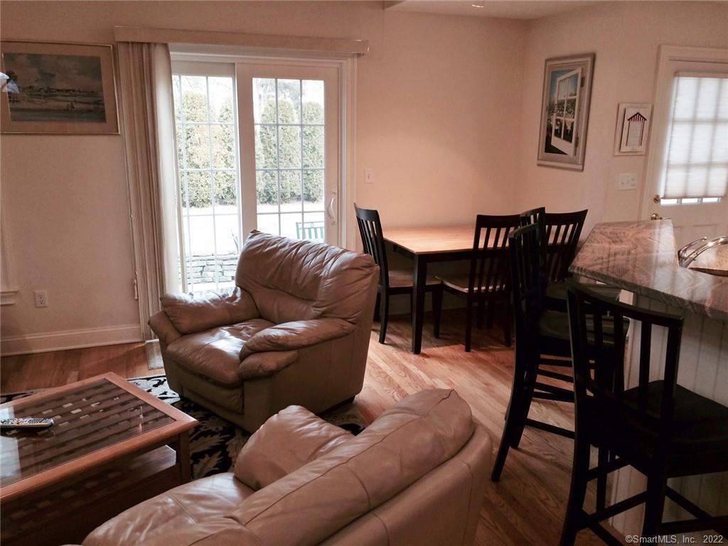 57 Harbor Avenue Madison, CT 06443 - Photo 3 of 16 a living room with furniture and a window