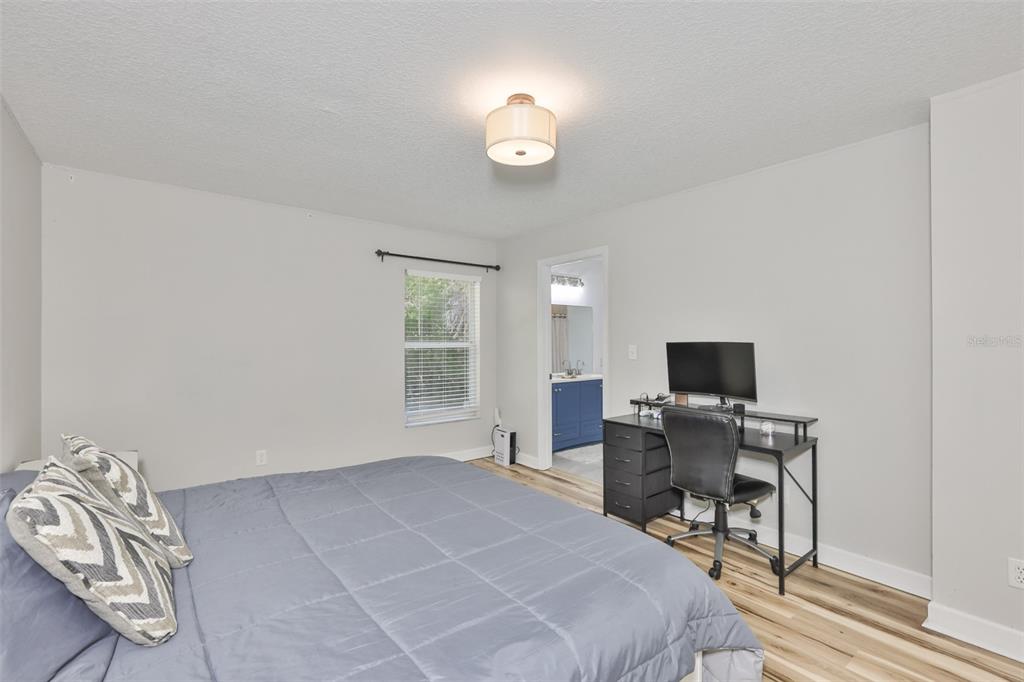 2331 West Chestnut Street Tampa, FL 33607 - Photo 18 of 34 a view of a workspace with furniture and a window