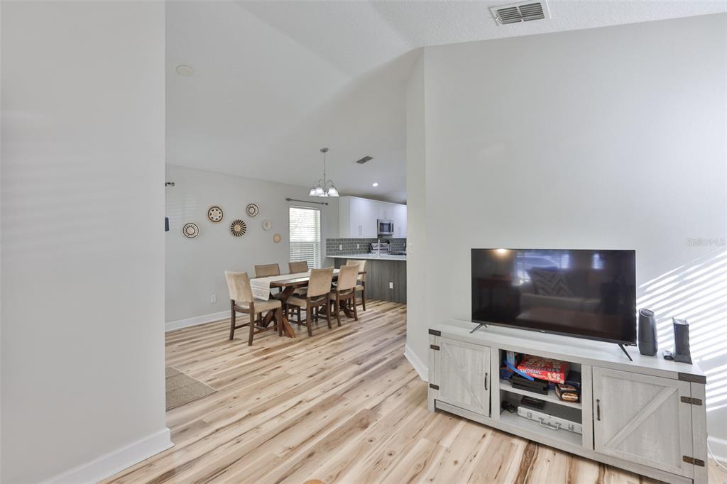2331 West Chestnut Street Tampa, FL 33607 - Photo 7 of 34 a living room with furniture and a flat screen tv