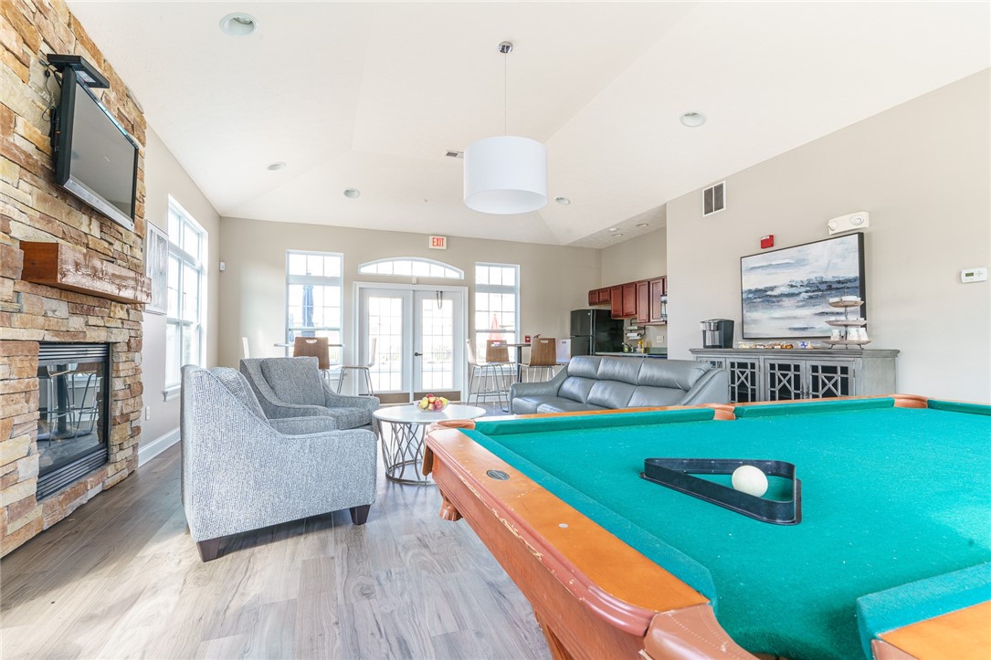 1260 Lehigh Station Road, Unit 1104 Henrietta, NY 14467 - Photo 11 of 14 View of Lehigh Park's Community Center with pool t