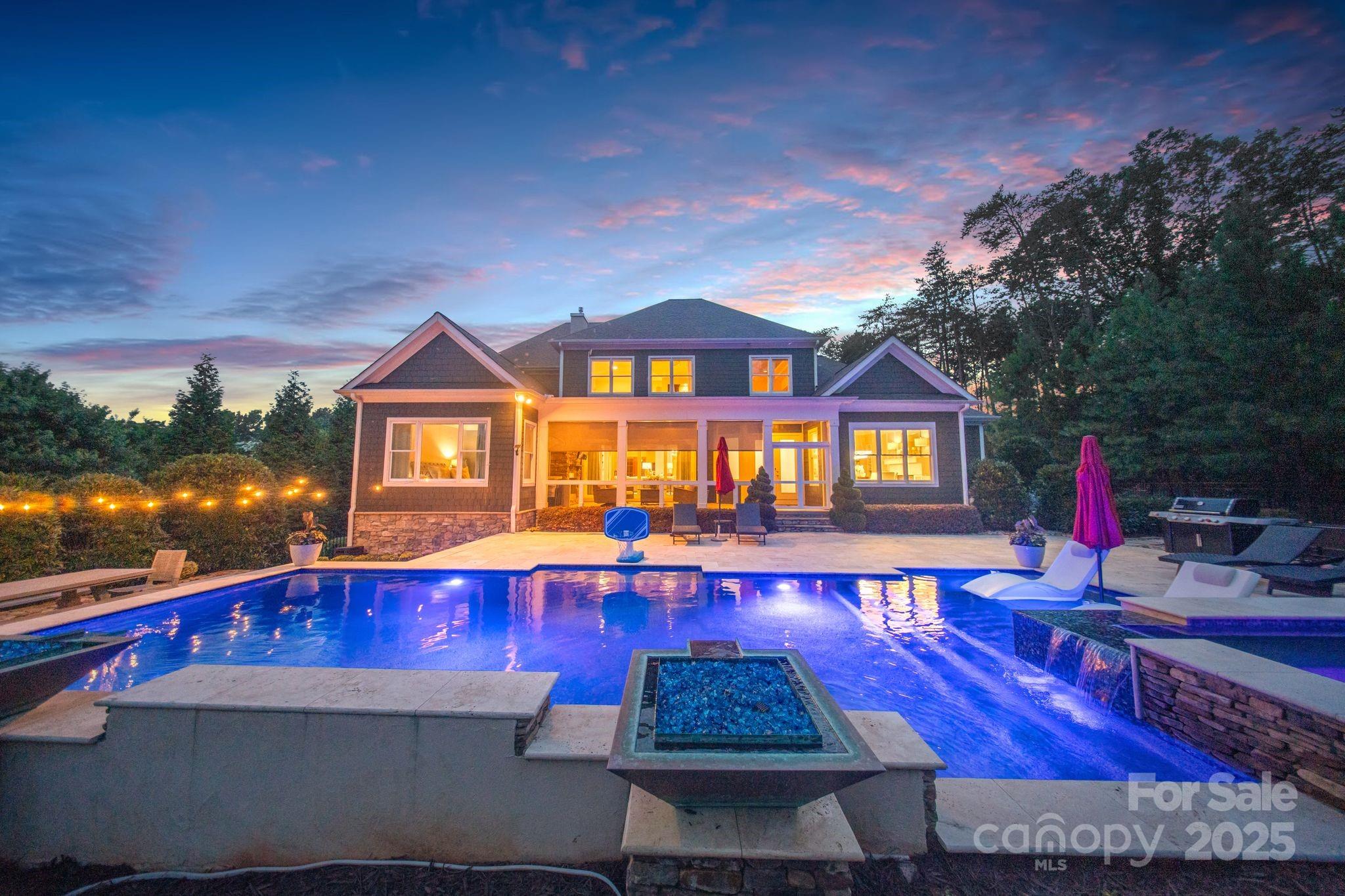 2051 Brawley School Road Mooresville, NC 28117 - Photo 1 of 47 a view of a house with pool and chairs