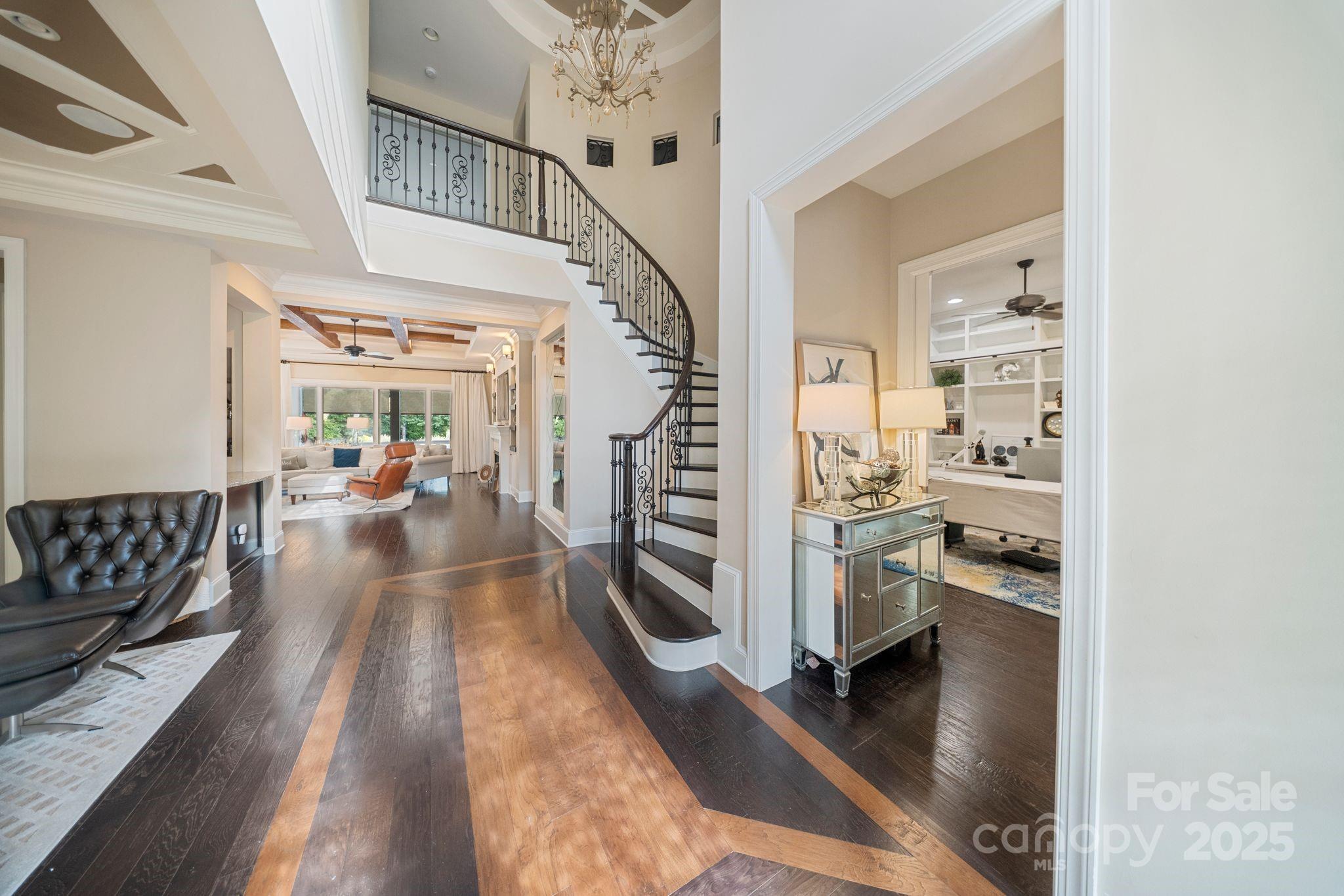 2051 Brawley School Road Mooresville, NC 28117 - Photo 11 of 47 a view of a hallway with furniture and staircase