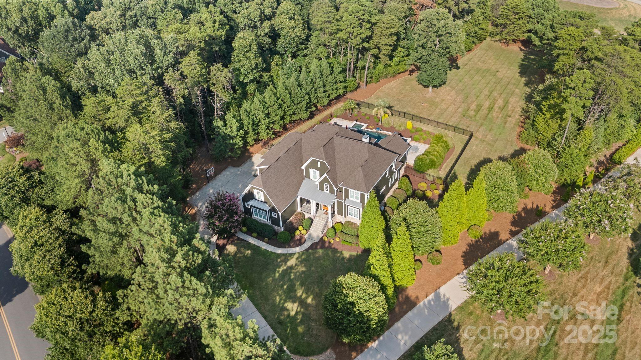 2051 Brawley School Road Mooresville, NC 28117 - Photo 45 of 47 an aerial view of a residential houses with outdoor space