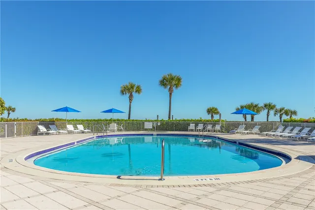 a view of a swimming pool and outdoor space