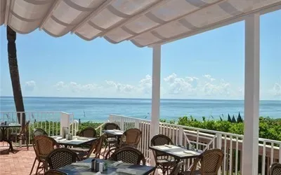 a view of swimming pool from a balcony