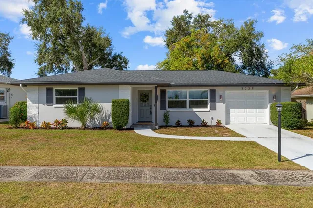 a front view of a house with swimming pool