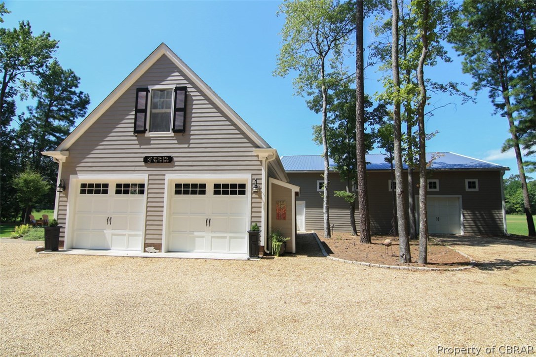 98 Flood Point Road Heathsville, VA 22473 - Photo 13 of 44 Between house & hangar is great 2-bay garage w/ roughed in 2nd floor.
