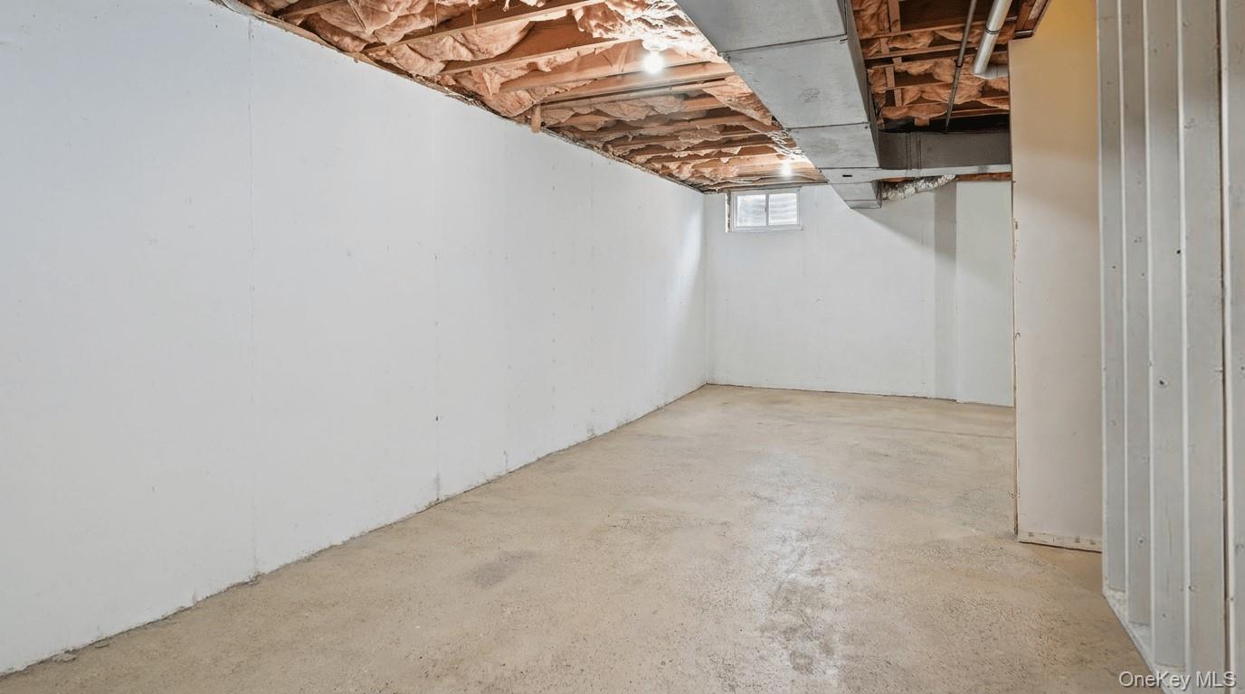 49 Canoe Place Road, Unit 416 Hampton Bays, NY 11946 - Photo 25 of 30 Basement for finishing or storage
