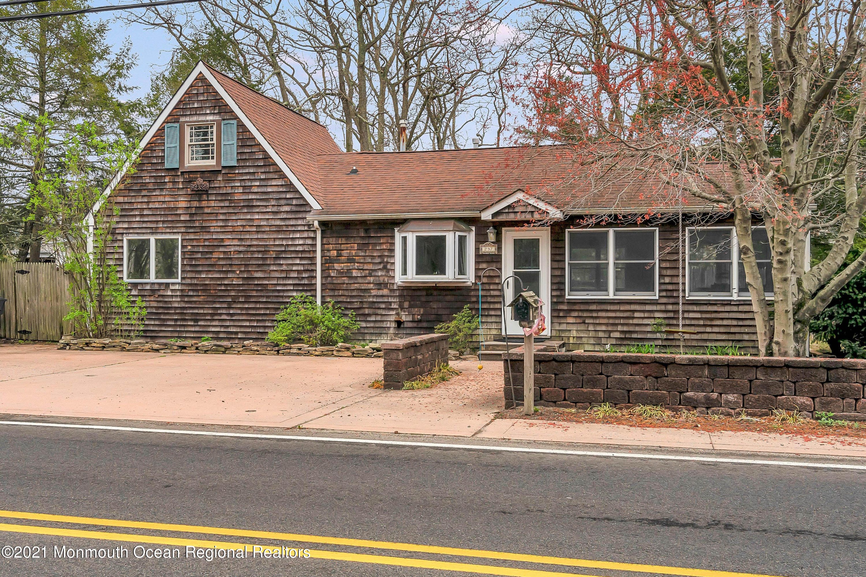 front view of a house with a small yard