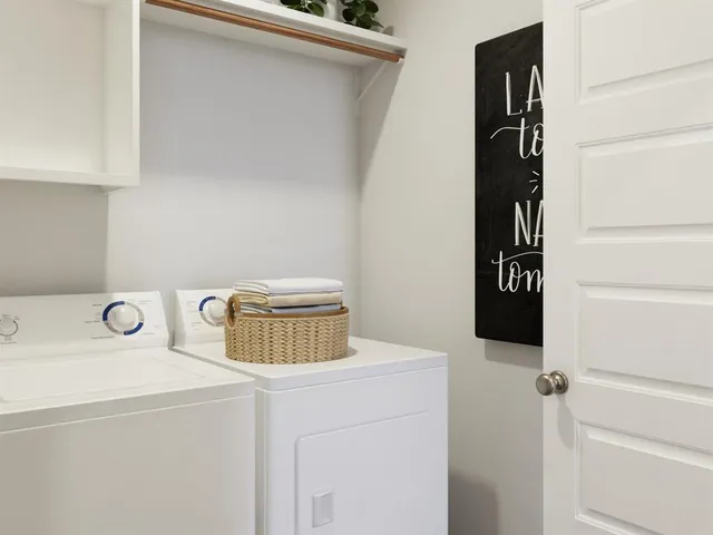 a bedroom with a bed and a mirror