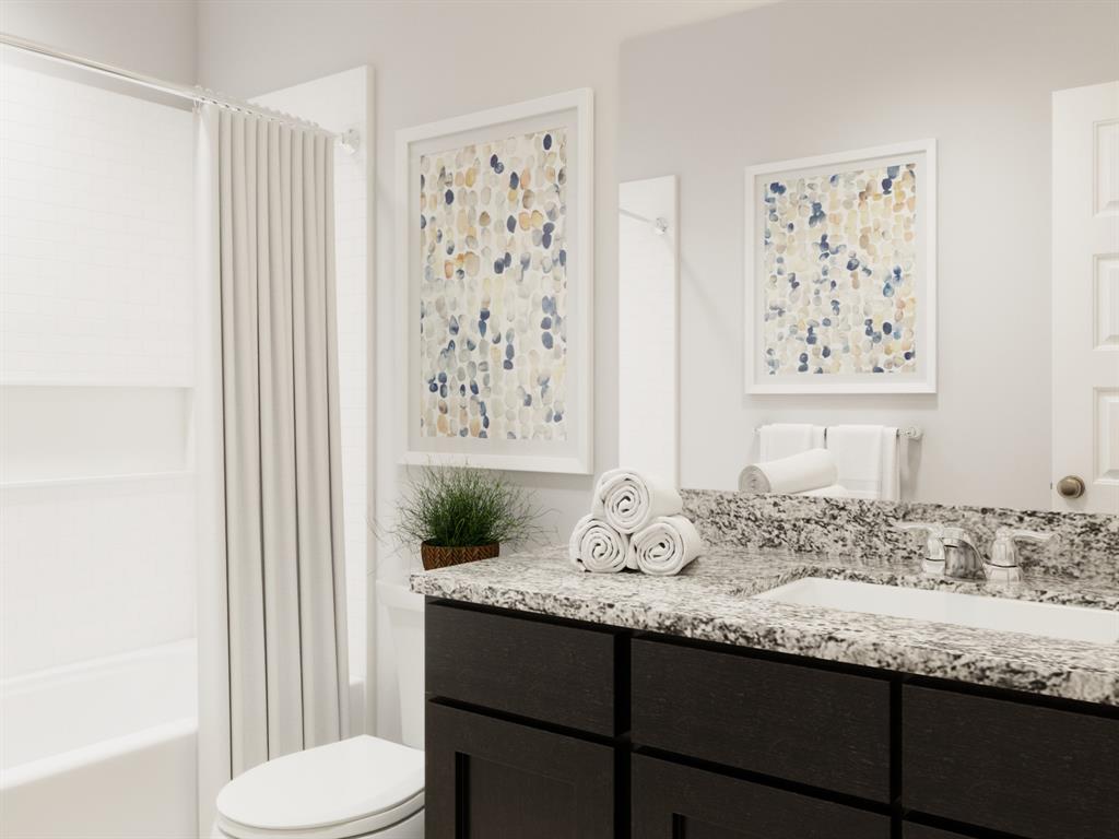 1510 Romans Road Ennis, TX 75119 - Photo 35 of 40 a bathroom with a granite countertop sink and a toilet