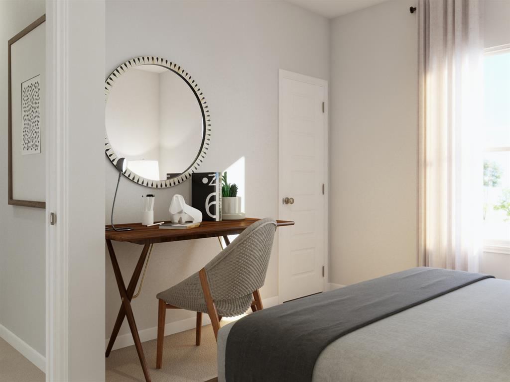 1510 Romans Road Ennis, TX 75119 - Photo 37 of 40 a bedroom with a bed a table and chair