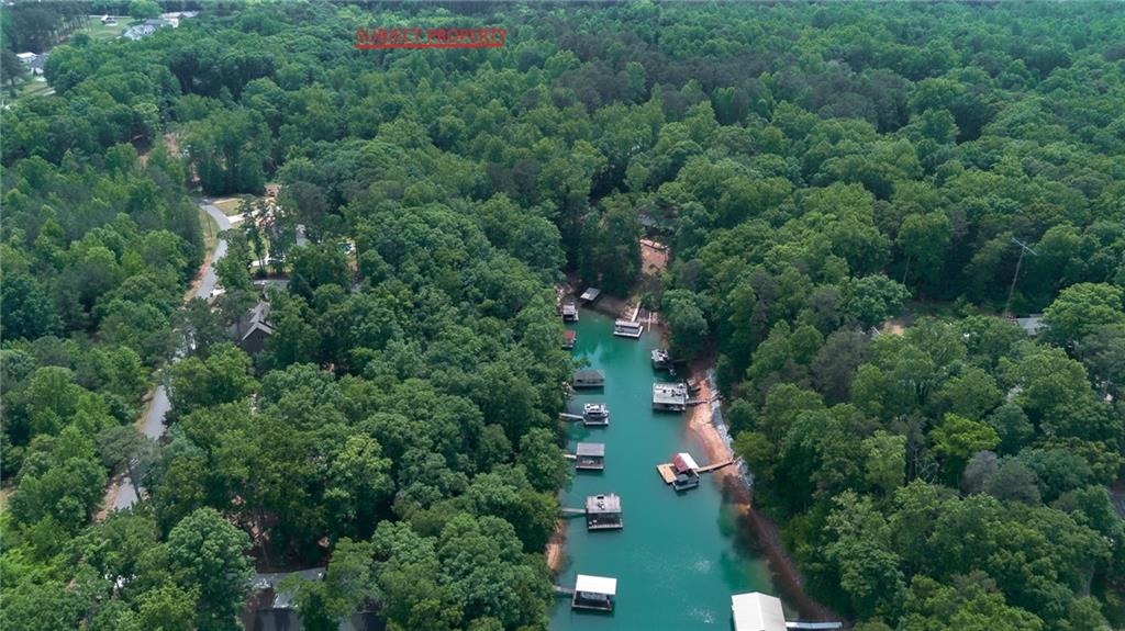 0 Indian Knoll Road Cumming, GA 30041 - Photo 5 of 17 an aerial view of residential house with outdoor space and trees all around