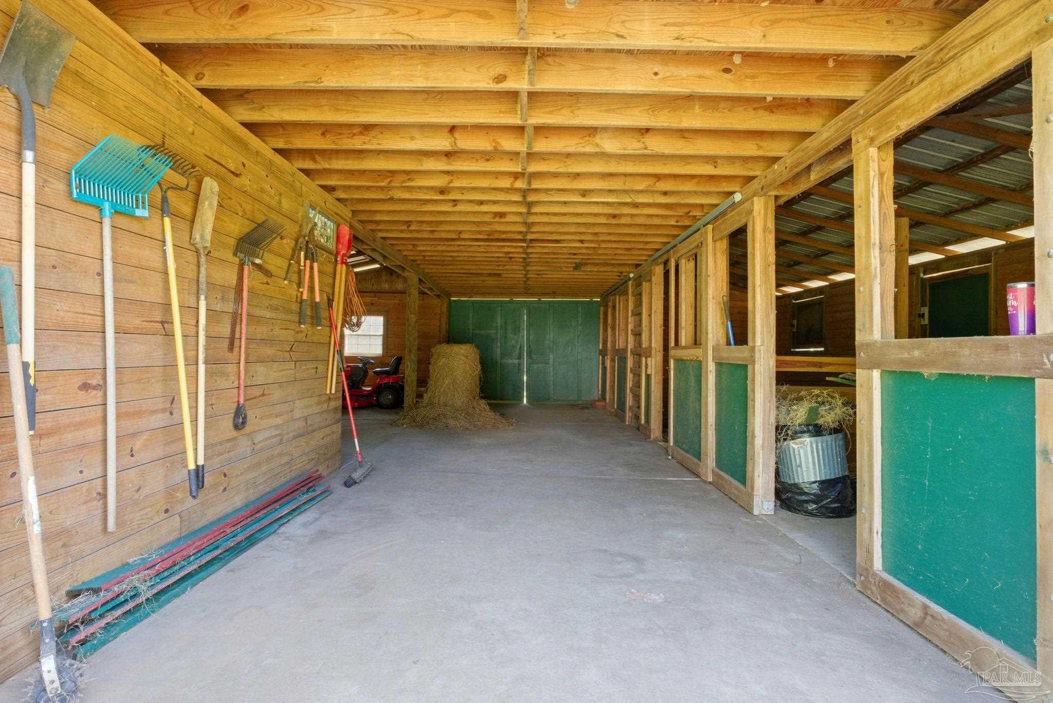 6870 Martin Road Milton, FL 32570 - Photo 40 of 48 a view of a room with wooden walls