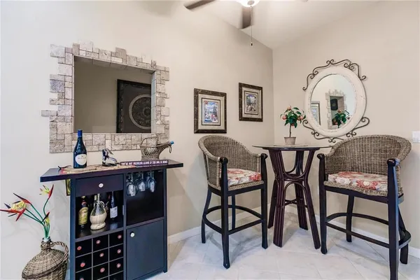 a dining room with furniture and window