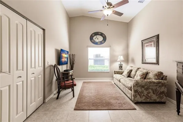 a living room with furniture and a window