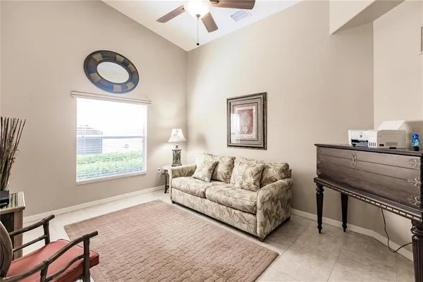 a living room with furniture and a window