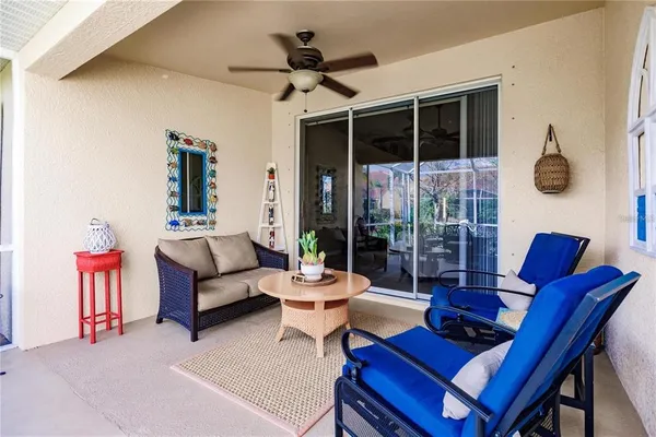 a outdoor living space with furniture and a window