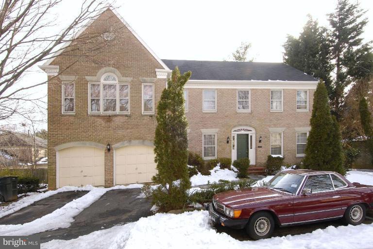 4806 32nd Street Northwest Washington, DC 20008 - Photo 1 of 1 a front view of a house with parking space