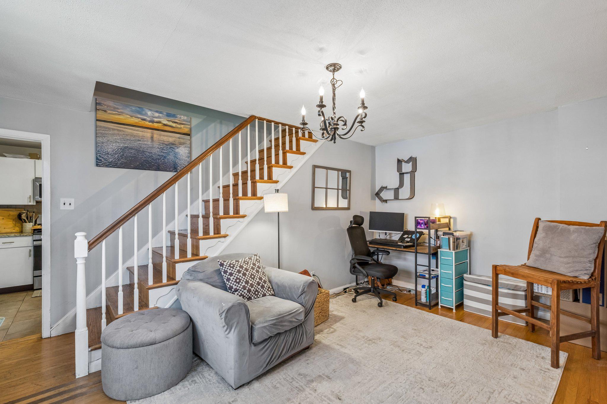 725 Hill Road Philadelphia, PA 19128 - Photo 5 of 43 a living room with furniture and a flat screen tv