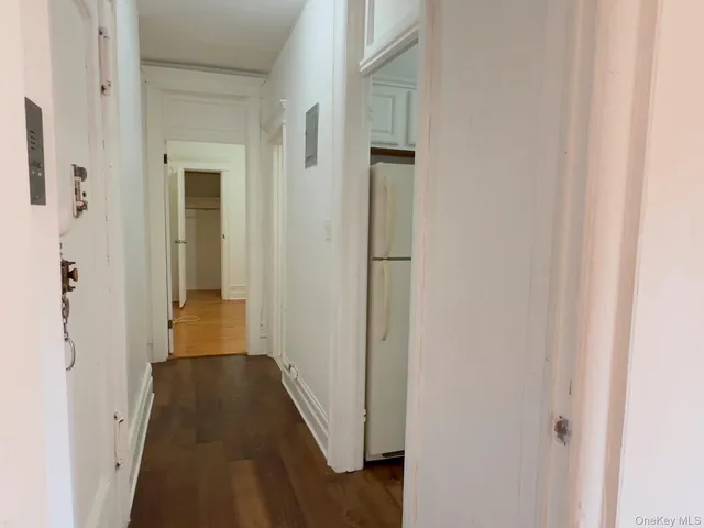 a view of a bathroom from the hallway