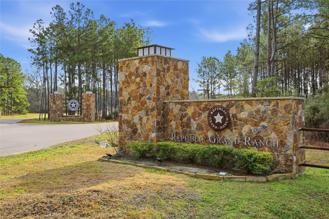 15466 Red Hawk Road Willis, TX 77378 - Photo 11 of 18 a view of a street with a building in the background