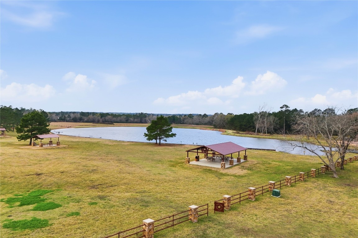 15466 Red Hawk Road Willis, TX 77378 - Photo 18 of 18 a view of an ocean and beach