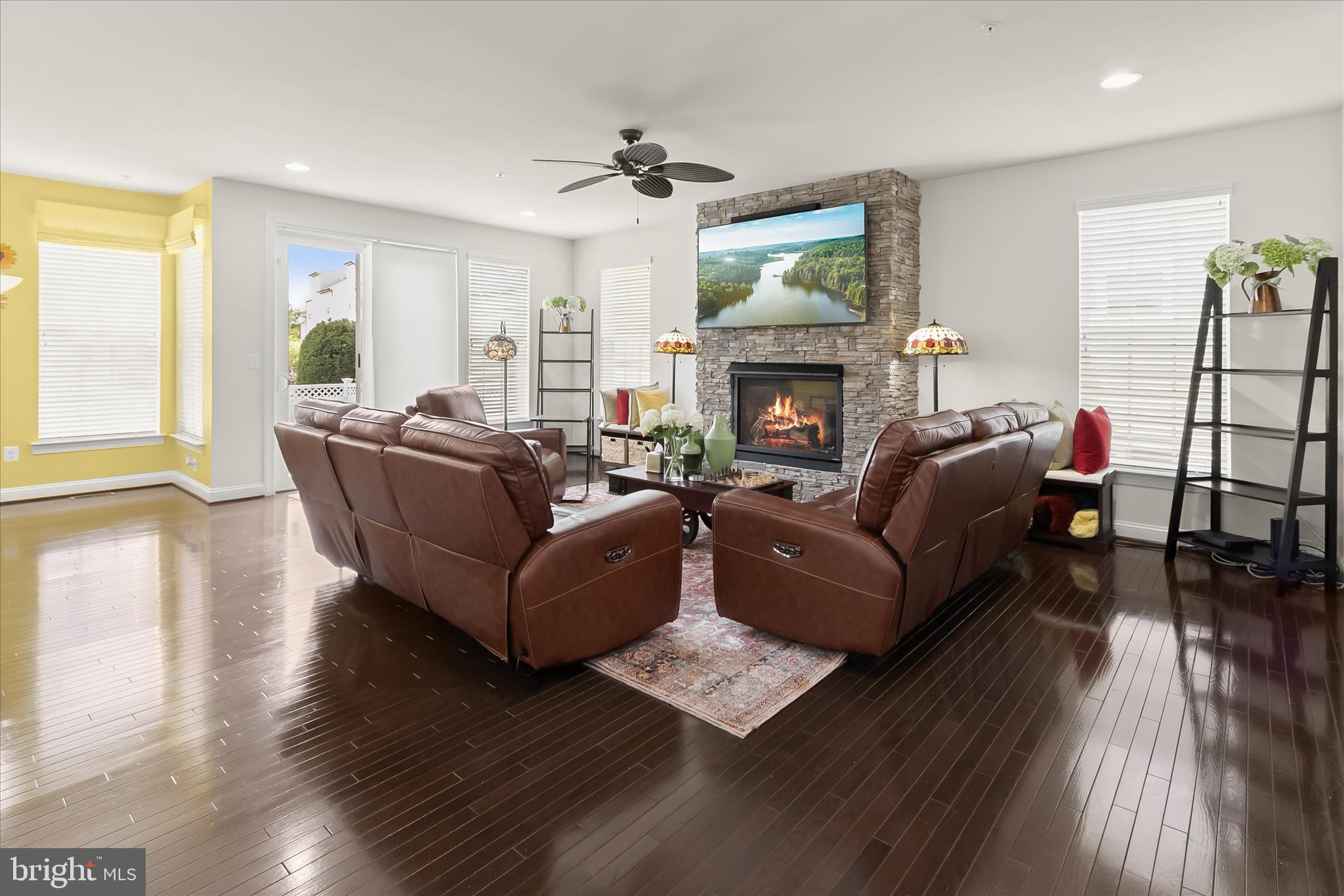13502 Windy Meadow Lane Silver Spring, MD 20906 - Photo 21 of 74 a living room with furniture and a fireplace