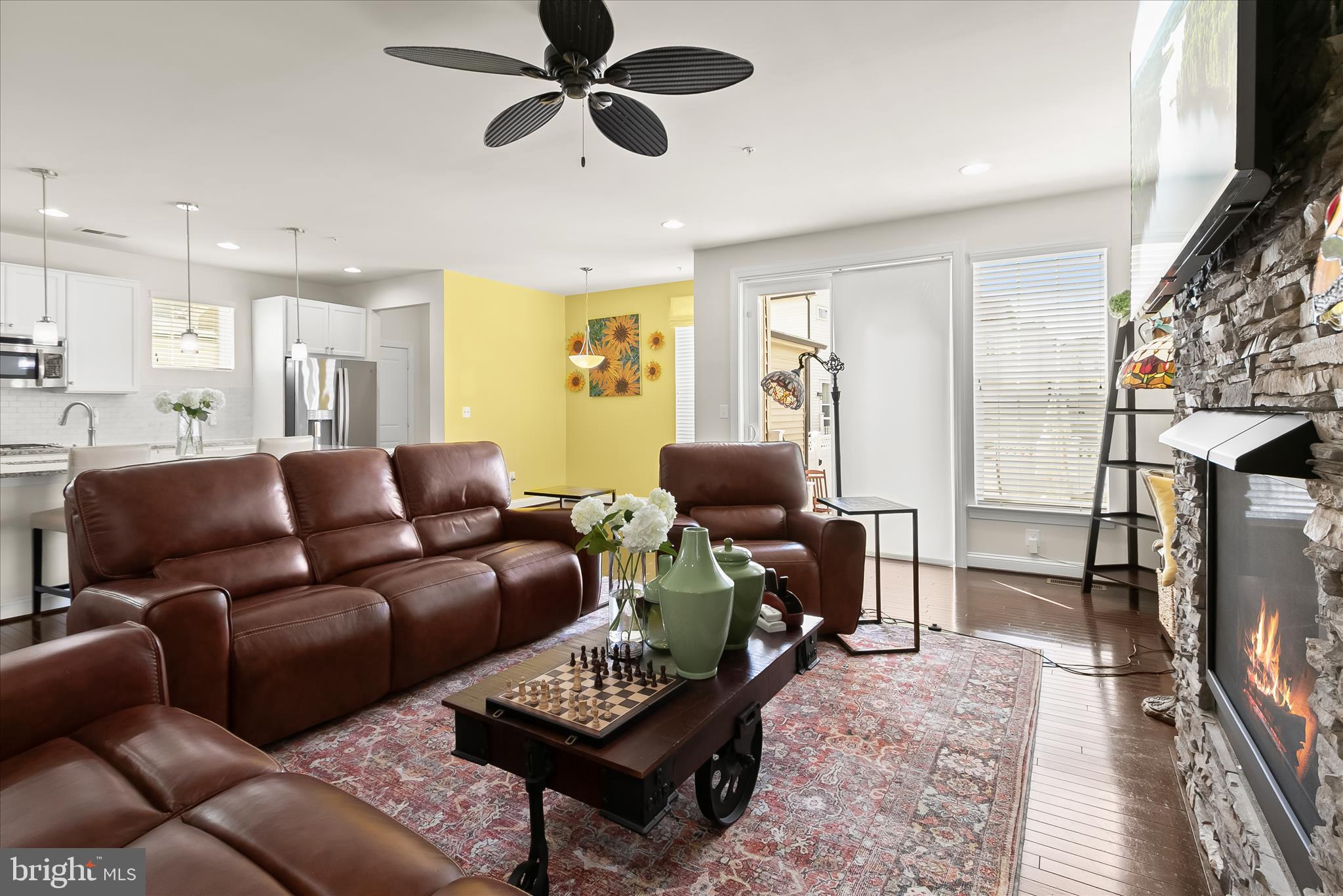 13502 Windy Meadow Lane Silver Spring, MD 20906 - Photo 22 of 74 a living room with furniture a flat screen tv and a window