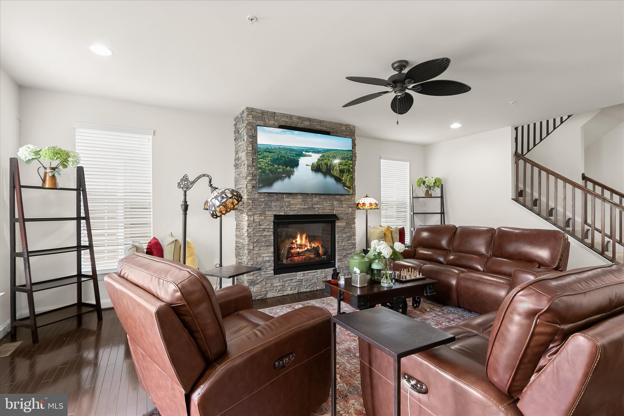 13502 Windy Meadow Lane Silver Spring, MD 20906 - Photo 23 of 74 a living room with furniture and a fireplace