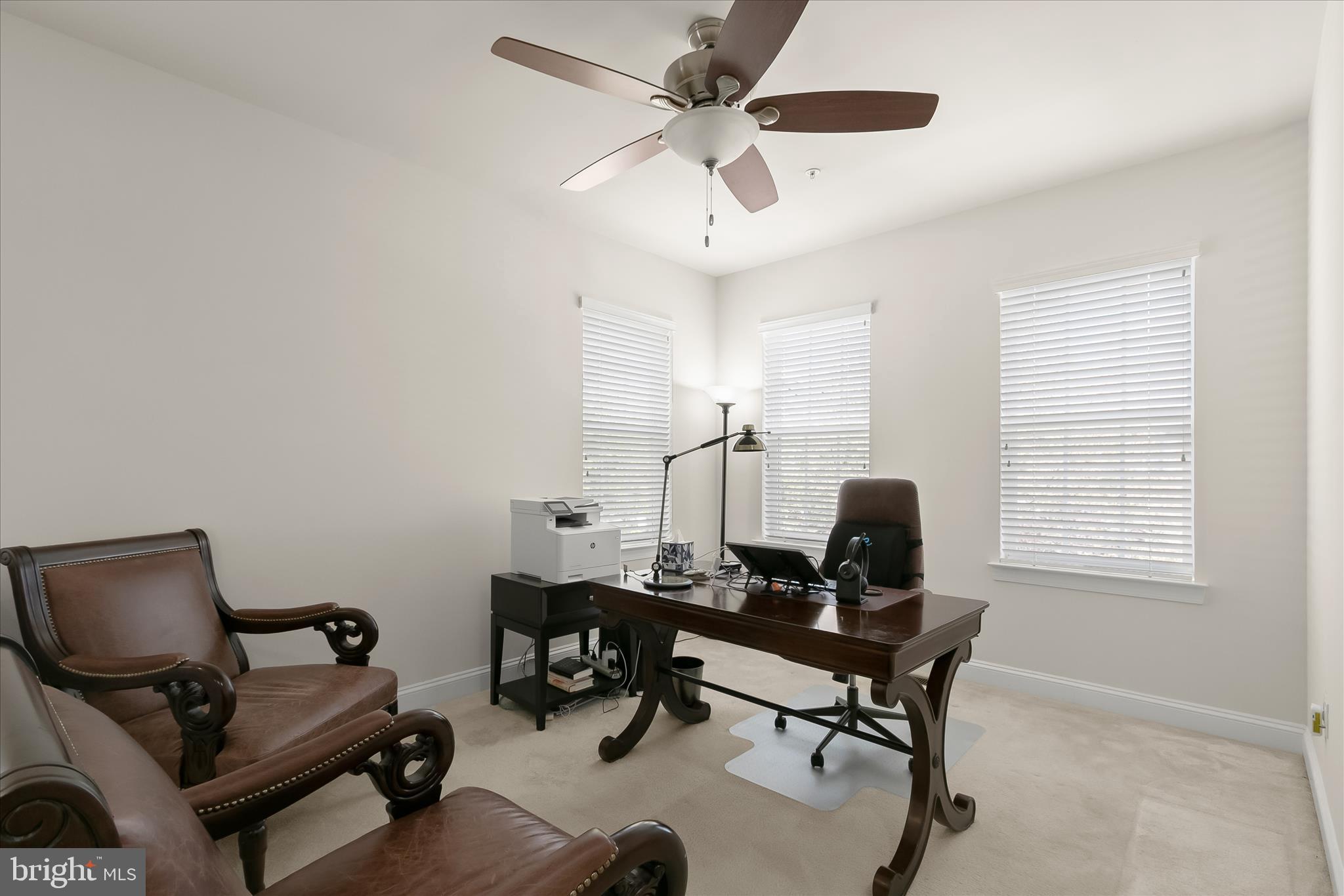 13502 Windy Meadow Lane Silver Spring, MD 20906 - Photo 35 of 74 a workspace with chandelier