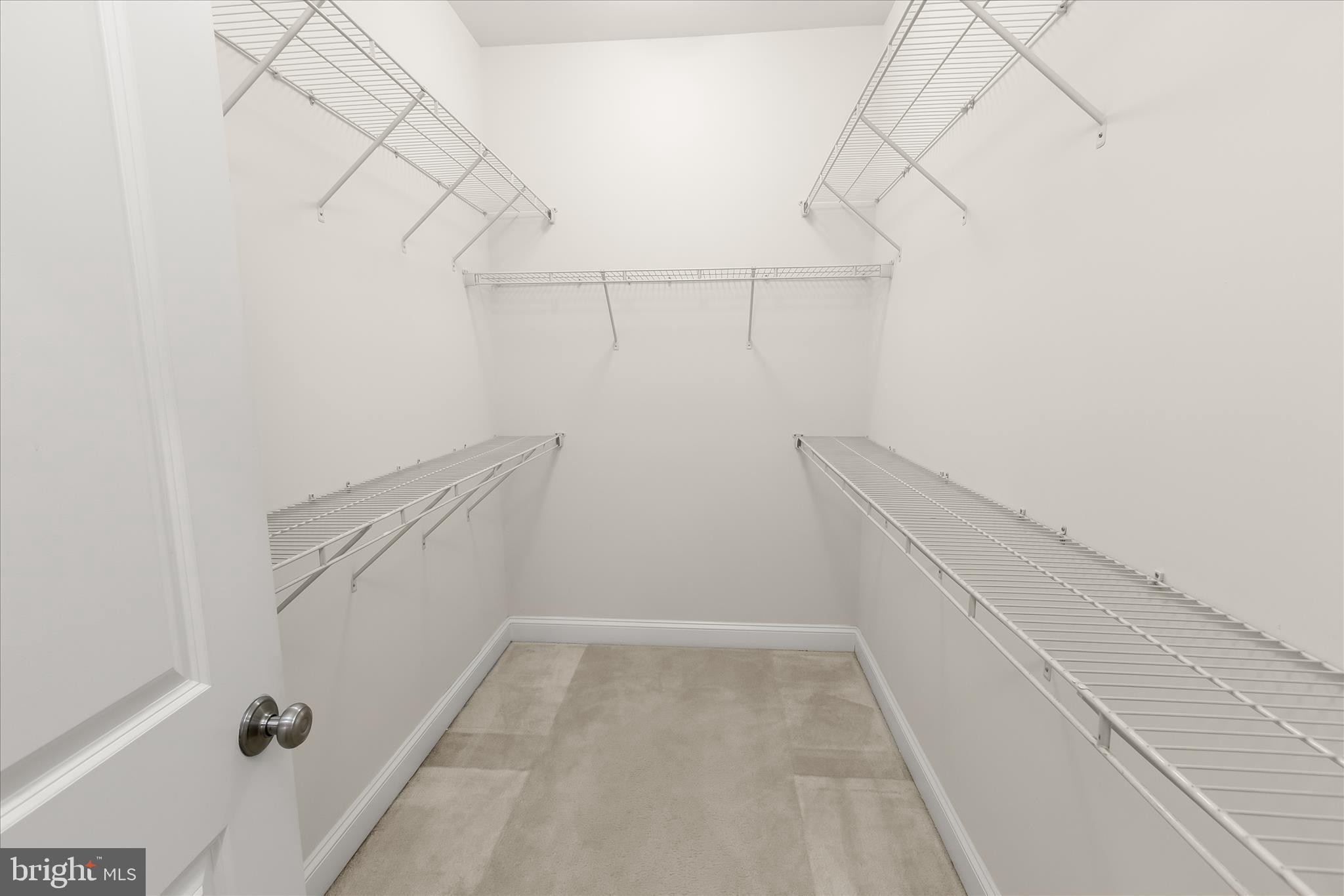13502 Windy Meadow Lane Silver Spring, MD 20906 - Photo 45 of 74 a view of a room with racks on the wall
