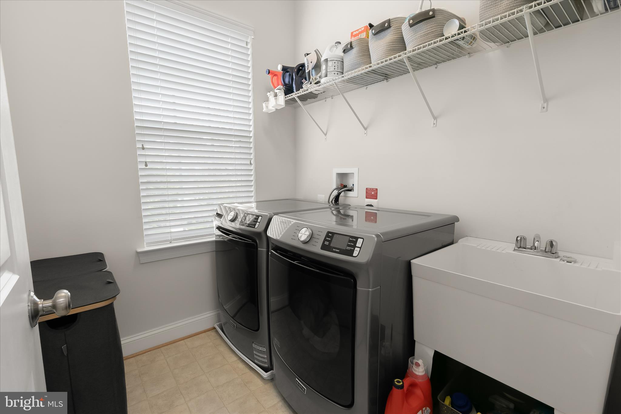 13502 Windy Meadow Lane Silver Spring, MD 20906 - Photo 54 of 74 a utility room with dryer and washer