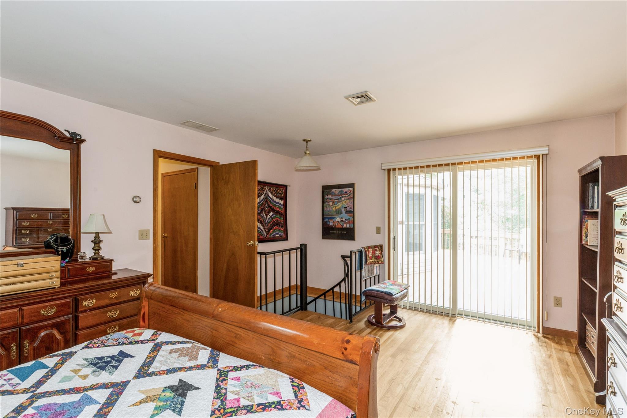 32 Lower Cross Shoreham, NY 11786 - Photo 13 of 20 a bedroom with furniture and a rug
