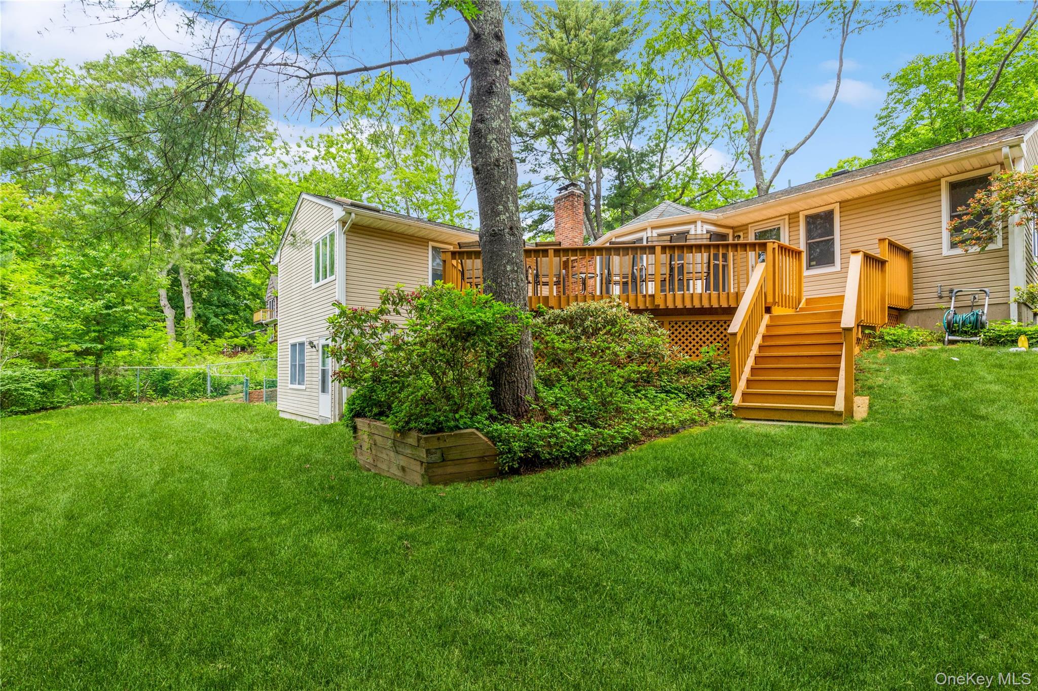 32 Lower Cross Shoreham, NY 11786 - Photo 20 of 20 a front view of a house with a yard