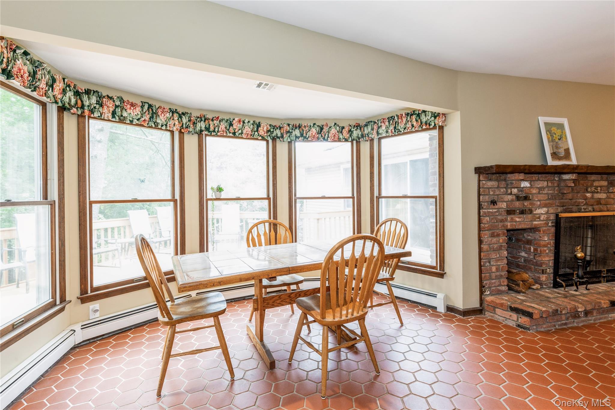 32 Lower Cross Shoreham, NY 11786 - Photo 4 of 20 a view of a dining room with furniture window and outside view