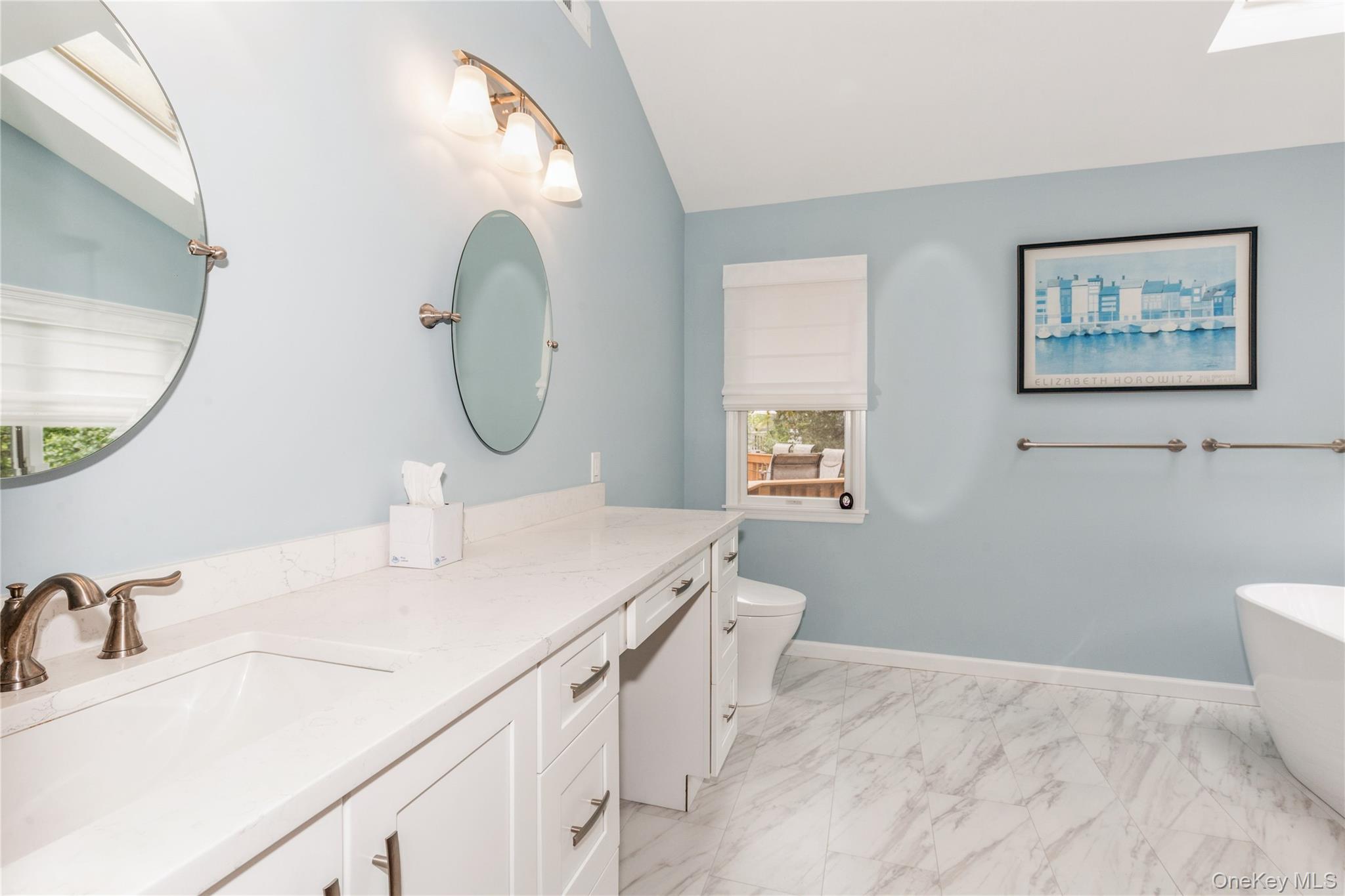 32 Lower Cross Shoreham, NY 11786 - Photo 10 of 20 a bathroom with a sink vanity and a mirror