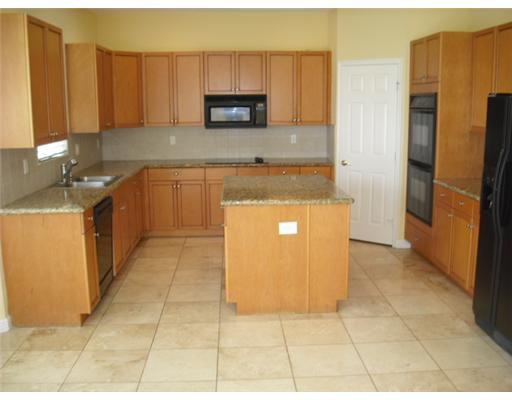 Undisclosed Address Wellington, FL 33414 - Photo 7 of 15 Exterior Front